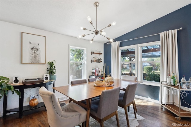 dining space with a chandelier, vaulted ceiling, and dark hardwood / wood-style flooring