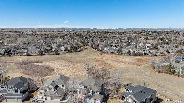 birds eye view of property with a residential view