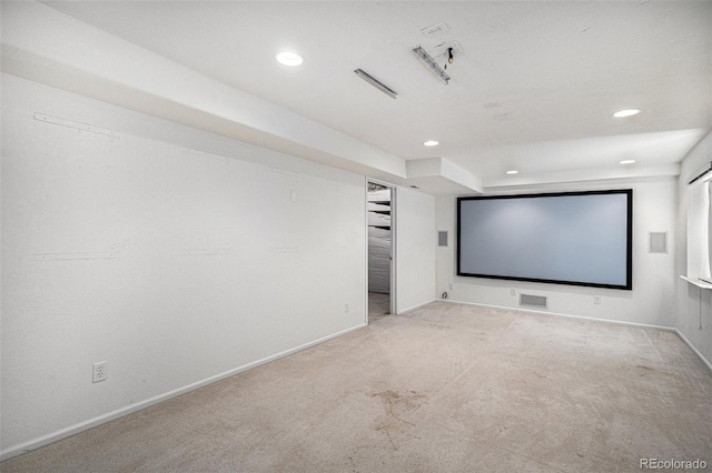 carpeted cinema room with recessed lighting, baseboards, and visible vents