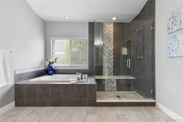 full bathroom with a garden tub, baseboards, a stall shower, and recessed lighting