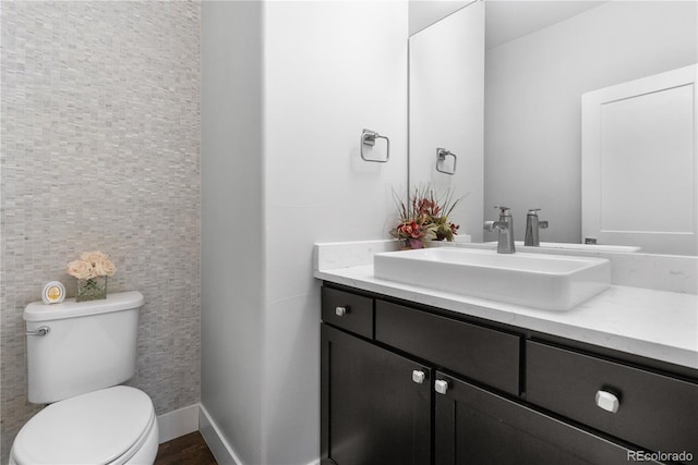 half bath with toilet and vanity