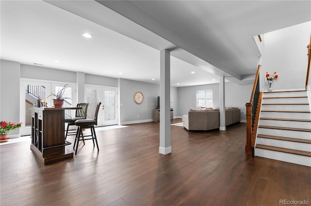 living room with baseboards, stairway, dark wood finished floors, and recessed lighting
