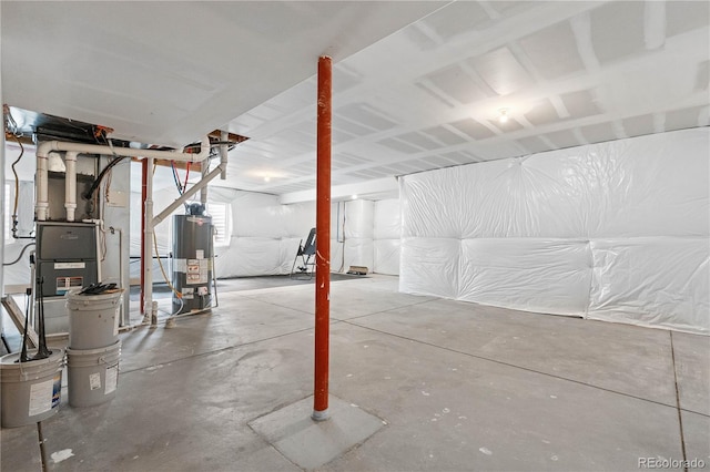 unfinished basement with water heater