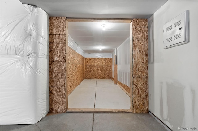 corridor featuring concrete flooring