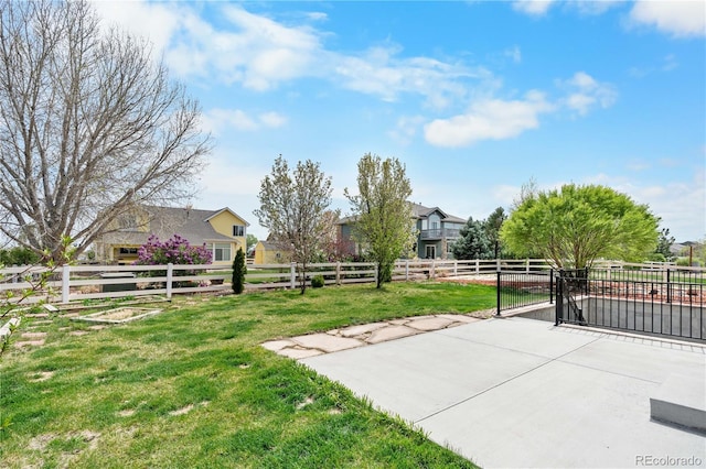 exterior space with fence and a gate