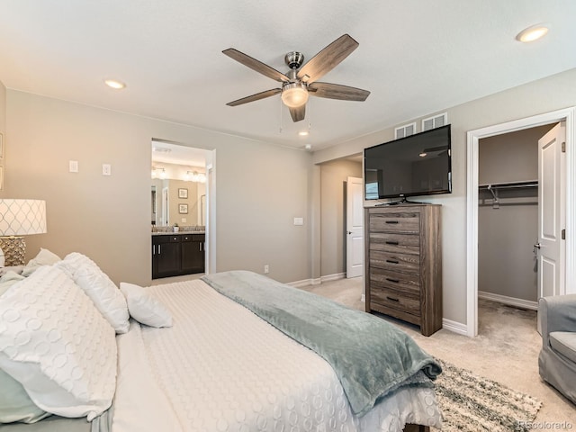 11902 Norfolk Ct, Commerce City, CO 80022 - bedroom featuring light colored carpet, a spacious closet, ceiling fan, recessed lighting, and connected bathroom