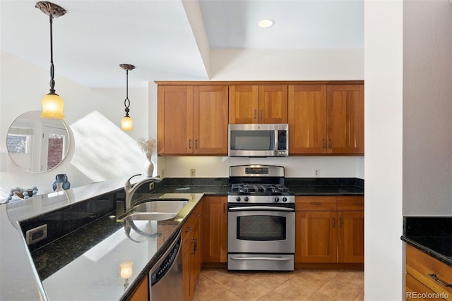 443 Garfield St, Denver, CO 80206 - kitchen featuring stainless steel appliances, a sink, brown cabinets, and hanging light fixtures