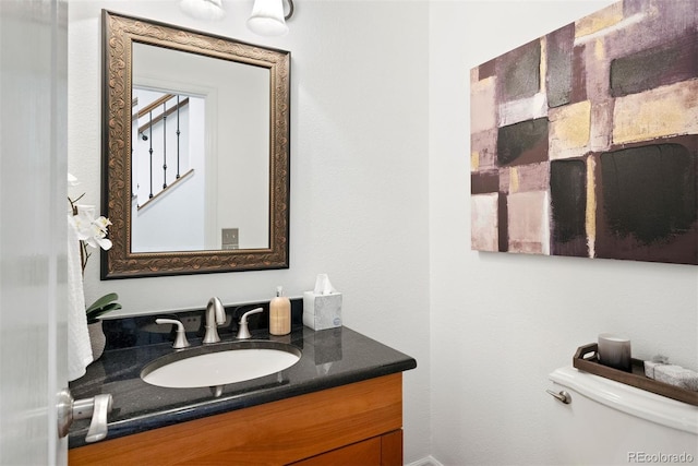 443 Garfield St, Denver, CO 80206 - half bathroom featuring vanity and toilet