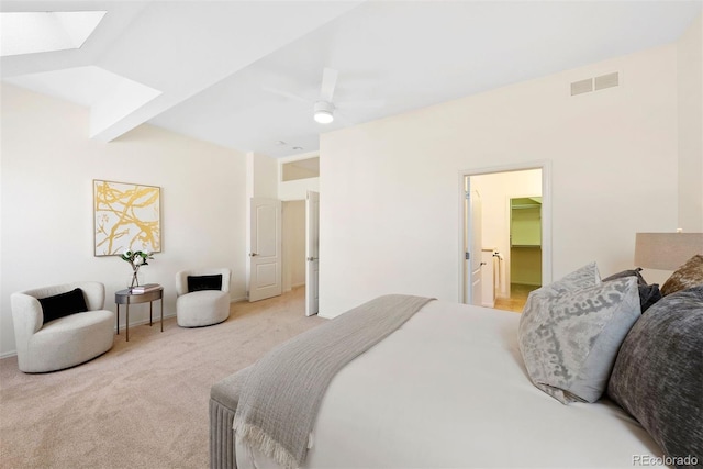 443 Garfield St, Denver, CO 80206 - bedroom with a skylight, light carpet, ceiling fan, and a walk in closet