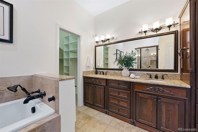 443 Garfield St, Denver, CO 80206 - bathroom featuring double vanity, a bath, tiled shower, and tile patterned flooring