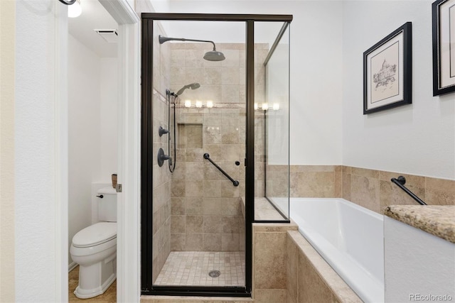 443 Garfield St, Denver, CO 80206 - bathroom with a stall shower, a garden tub, and toilet