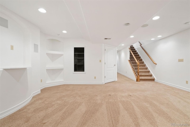443 Garfield St, Denver, CO 80206 - empty room featuring carpet flooring, stairway, baseboards, recessed lighting, and built in features