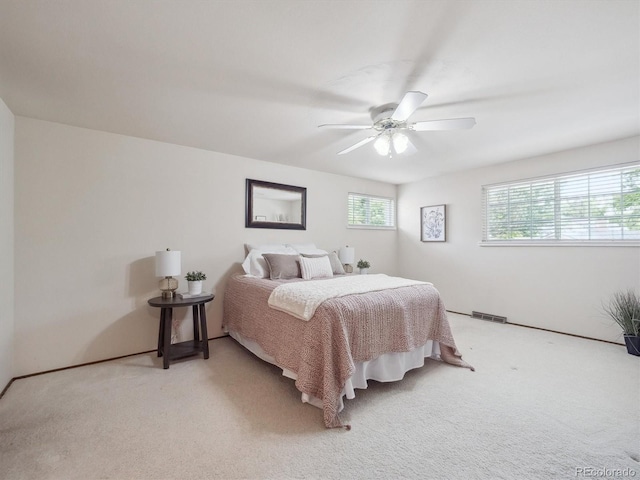 6898 W Nova Dr, Littleton, CO 80128 - bedroom featuring light carpet, a ceiling fan, and baseboards