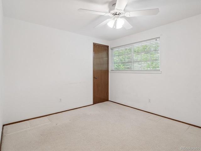 6898 W Nova Dr, Littleton, CO 80128 - empty room with light colored carpet, a ceiling fan, and baseboards