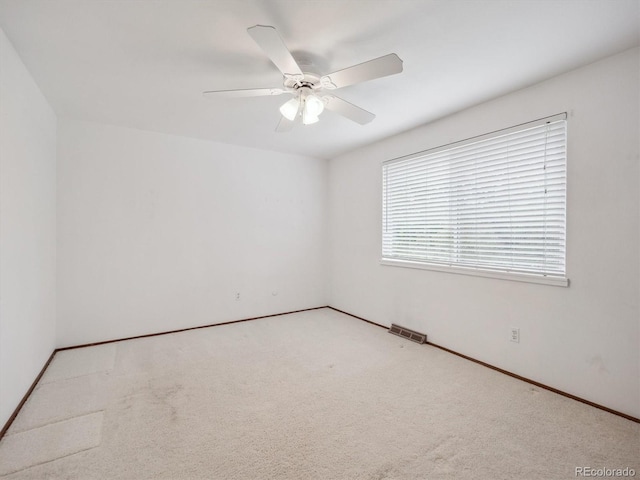 6898 W Nova Dr, Littleton, CO 80128 - carpeted spare room featuring a ceiling fan and baseboards