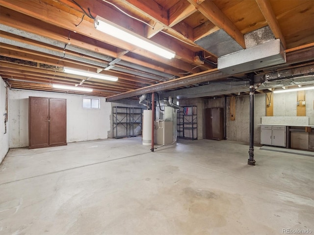 6898 W Nova Dr, Littleton, CO 80128 - basement featuring water heater and heating unit