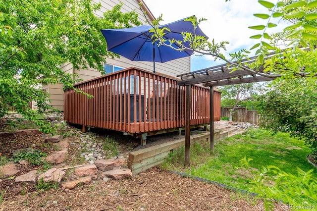 wooden deck featuring fence