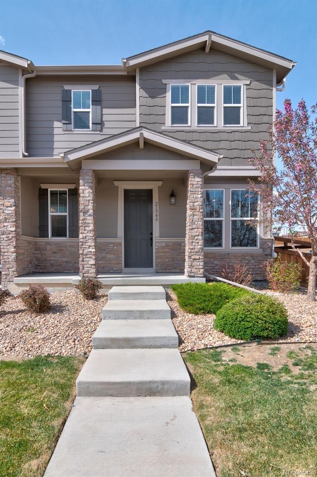 view of front of home with stone siding
