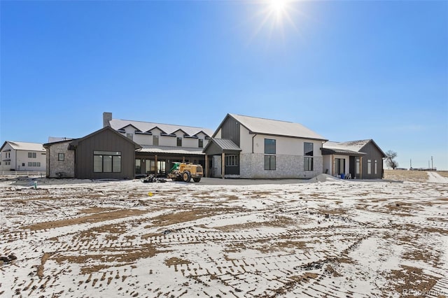 view of snow covered property