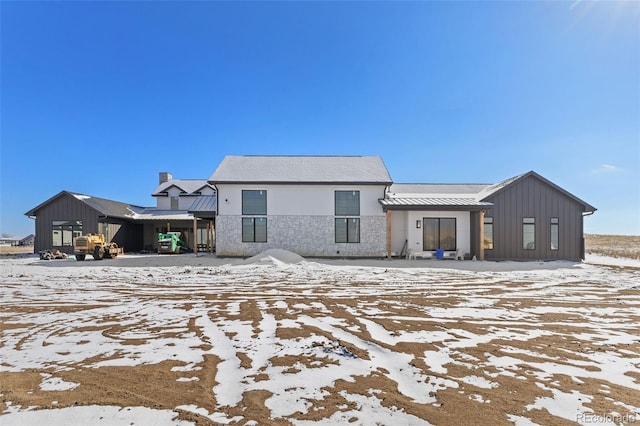 view of snow covered property