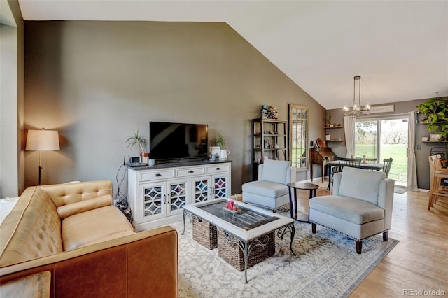 8680 Apache Plume Dr, Parker, CO 80134 - living area featuring a chandelier, light wood finished floors, and high vaulted ceiling