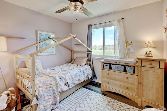 8680 Apache Plume Dr, Parker, CO 80134 - bedroom with wood finished floors and ceiling fan