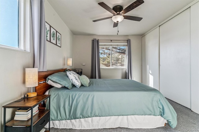 bedroom featuring ceiling fan and carpet floors