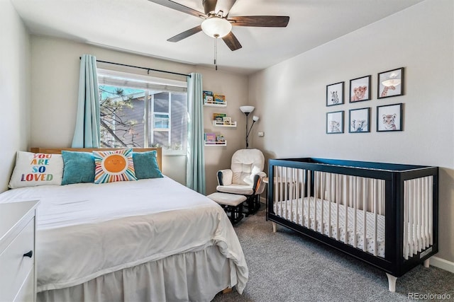 carpeted bedroom with ceiling fan