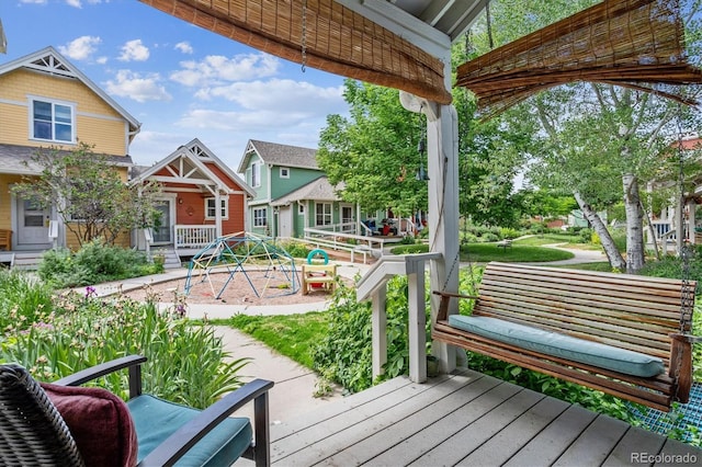 wooden terrace with a porch