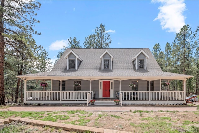 50 Victoria Rd, Pine, CO 80470 - country-style home with covered porch and a shingled roof