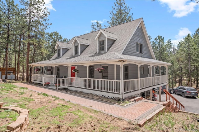 50 Victoria Rd, Pine, CO 80470 - farmhouse inspired home with covered porch and a shingled roof