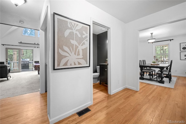 50 Victoria Rd, Pine, CO 80470 - corridor featuring healthy amount of natural light, light wood-style flooring, and baseboards