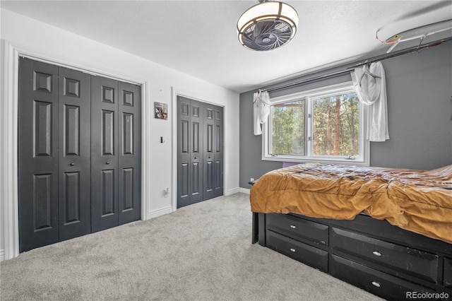 50 Victoria Rd, Pine, CO 80470 - bedroom featuring multiple closets, carpet, and baseboards