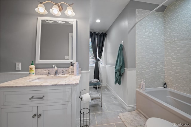 50 Victoria Rd, Pine, CO 80470 - full bathroom with a garden tub, vanity, tile patterned floors, toilet, and a shower