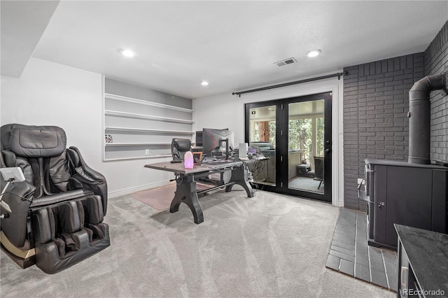 50 Victoria Rd, Pine, CO 80470 - office space featuring light carpet, recessed lighting, baseboards, a wood stove, and french doors