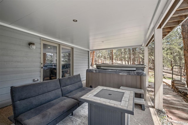50 Victoria Rd, Pine, CO 80470 - view of patio / terrace featuring a hot tub and an outdoor hangout area