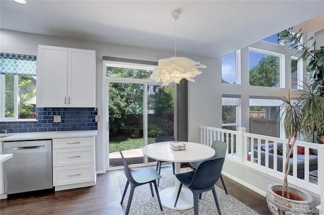5757 W Alamo Dr, Denver, CO 80123 - dining room featuring dark wood-type flooring and baseboards