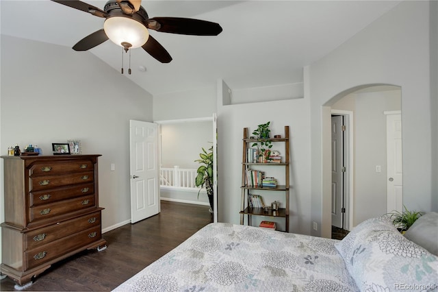 5757 W Alamo Dr, Denver, CO 80123 - bedroom featuring arched walkways, wood finished floors, lofted ceiling, and ceiling fan