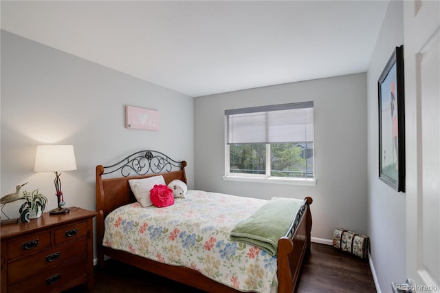 5757 W Alamo Dr, Denver, CO 80123 - bedroom with dark wood-style floors and baseboards