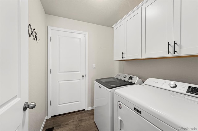 9869 Meridian Hills Trl, Peyton, CO 80831 - laundry area with separate washer and dryer, cabinet space, dark wood-type flooring, and a textured ceiling