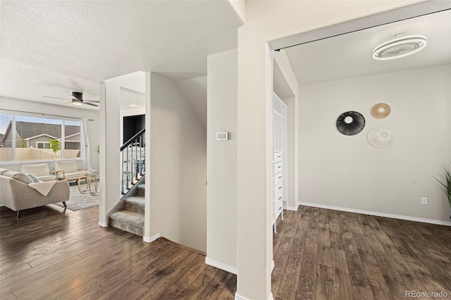 9869 Meridian Hills Trl, Peyton, CO 80831 - hallway with hardwood / wood-style floors and stairway