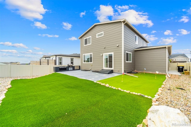 9869 Meridian Hills Trl, Peyton, CO 80831 - rear view of house with a patio area, a putting area, and entry steps