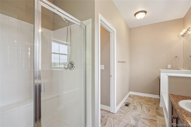 12921 Grant Cir Unit B, Thornton, CO 80241 - full bath featuring vanity, a shower stall, and baseboards