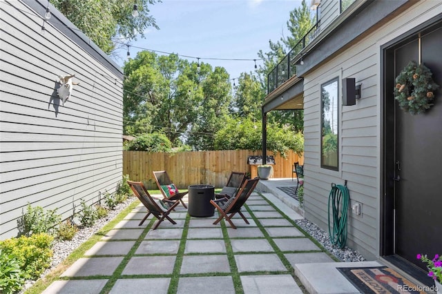 2838 Tennyson St, Denver, CO 80212 - view of patio / terrace featuring fence and a fire pit