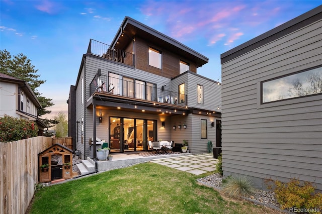 2838 Tennyson St, Denver, CO 80212 - rear view of property with a lawn, fence, a balcony, and a patio area
