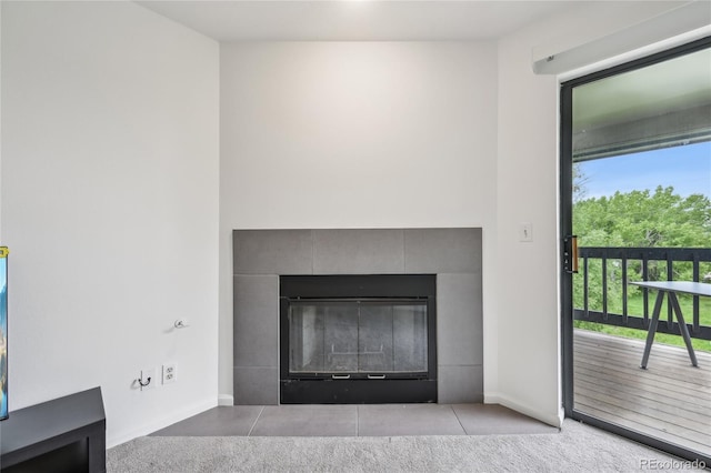 2727 Folsom St Unit 303, Boulder, CO 80304 - detailed view of a tile fireplace and baseboards