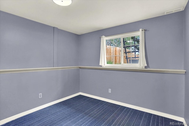 13496 Alcott Way, Broomfield, CO 80020 - unfurnished room featuring dark colored carpet and baseboards