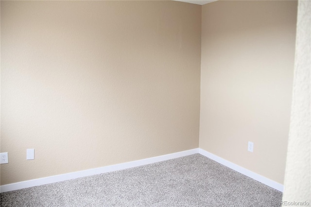 875 S Quebec St Unit 25, Denver, CO 80247 - unfurnished room featuring carpet floors and baseboards