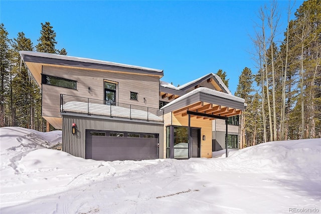 55 Blue Flag Dr, Breckenridge, CO 80424 - contemporary home with a balcony and an attached garage