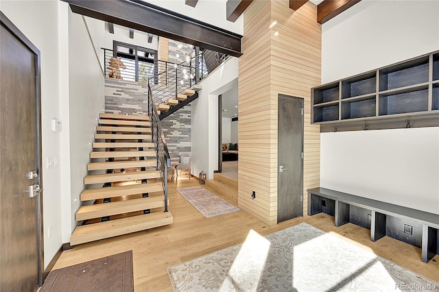 55 Blue Flag Dr, Breckenridge, CO 80424 - stairs featuring a towering ceiling and wood finished floors